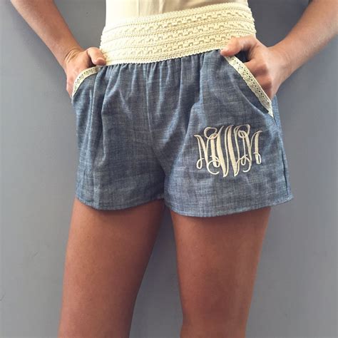 Monogram Accent Denim Mini Shorts .